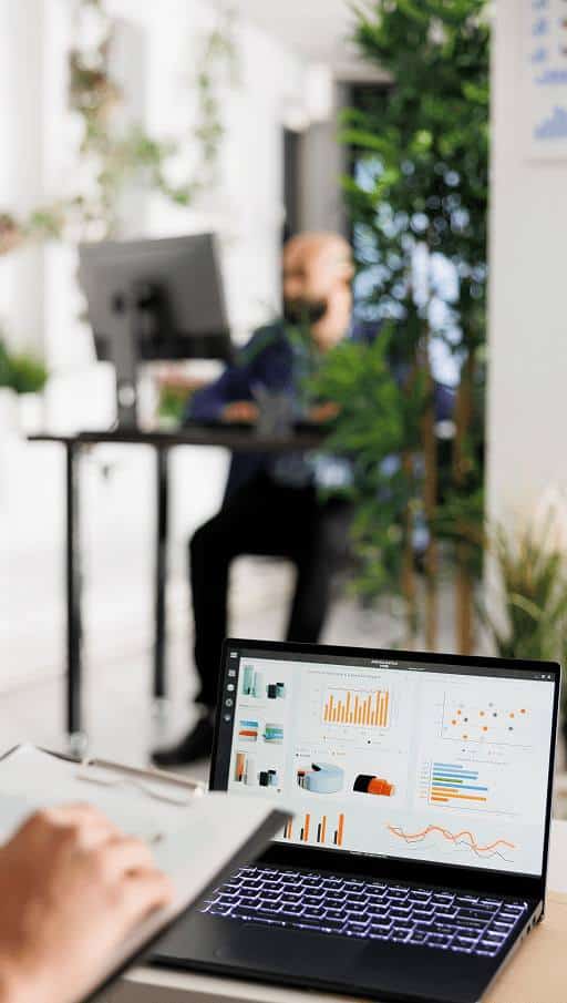 market research statistics graphs laptop screen start up company business office employee analyzing financial performance chart metrics portable computer coworking space 1 11zon